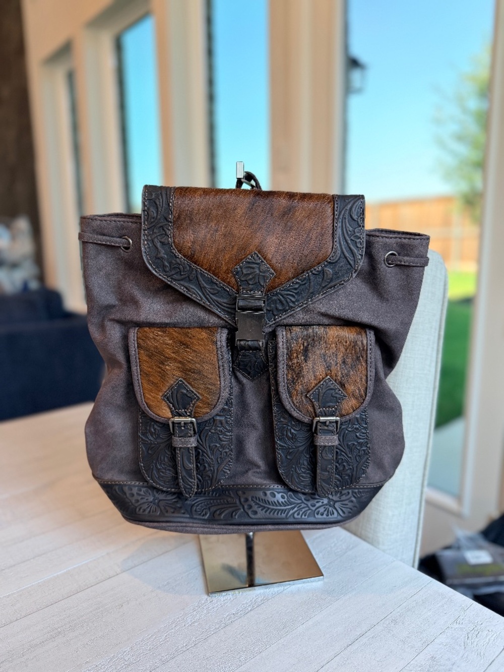 Trinity Ranch Genuine Hair-On Cowhide Tooled Backpack Coffee